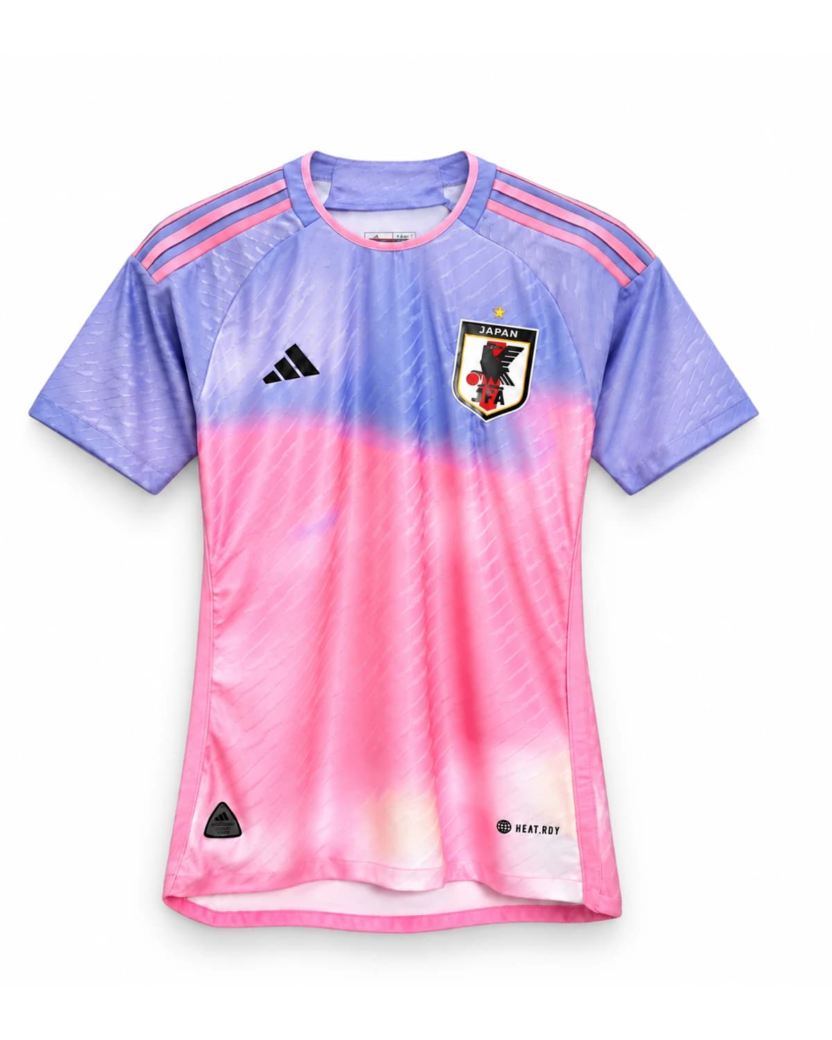 Japan jersey in pink and lavender gradient with dark crest, viewed from the front